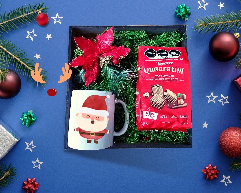 box con motivos navideños galletas importadas y taza