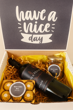 regalo con botella de vino tinto chileno ferrero rocher y botanas