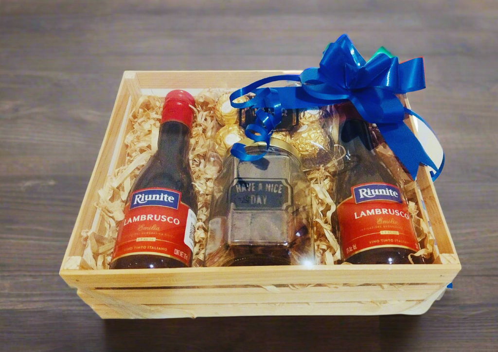 huacal con vino tinto espumoso riunite ferrero y pretzels